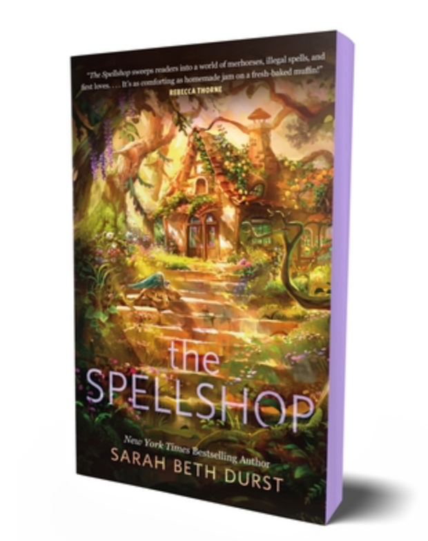 The spell shop by Sarah Beth Durst (hard cover sprayed edges)